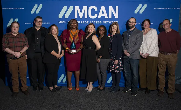 People from Bay College posing in a row